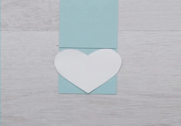 Cut and measure a heart shape onto a rectangular card