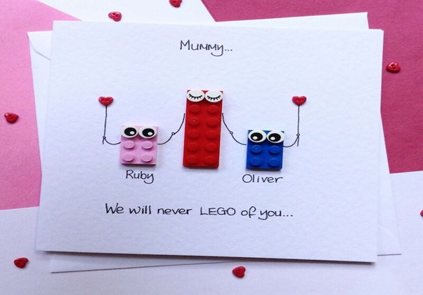 Teaching your baby to make cards for mom from Lego and crayons is also a great idea