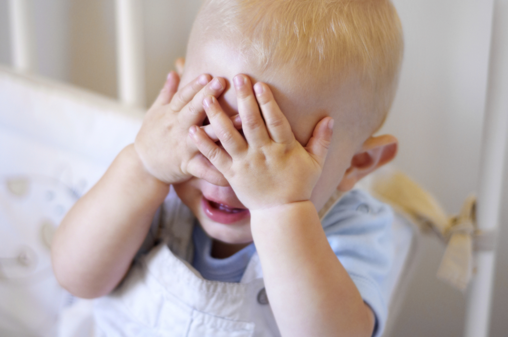 Instruct mothers on how to play peek-a-boo