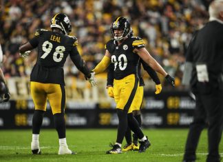 T.J. Watt #90 of the Pittsburgh Steelers celebrates with DeMarvin Leal #98 at Acrisure Stadium on September 18, 2023 in Pittsburgh, Pennsylvania.