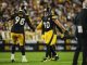 T.J. Watt #90 of the Pittsburgh Steelers celebrates with DeMarvin Leal #98 at Acrisure Stadium on September 18, 2023 in Pittsburgh, Pennsylvania.